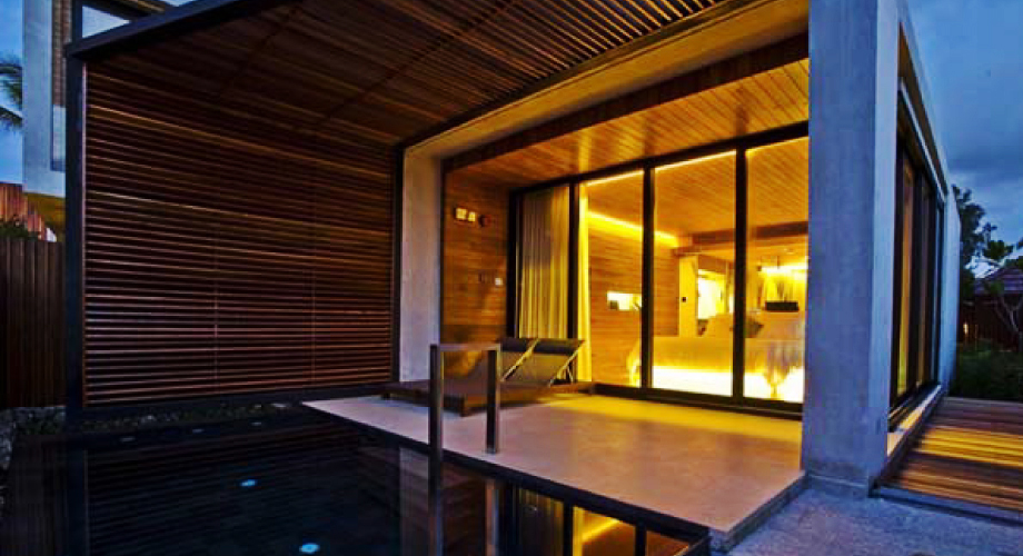 Under the wooden pergola of the Pole Pole Kenya Villas sitting on the clifftop edge; part of the Pole Pole kenya Hotel Resort & Spa development by RTAE